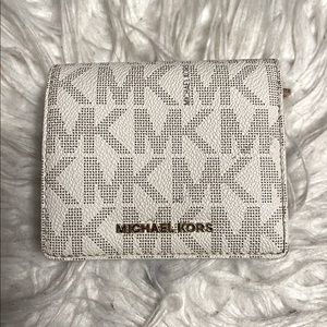 White and gold Michael Kors wallet